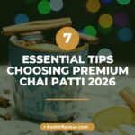 Close-up of premium chai patti loose leaf tea showing whole Assam CTC leaves, green cardamom pods, g