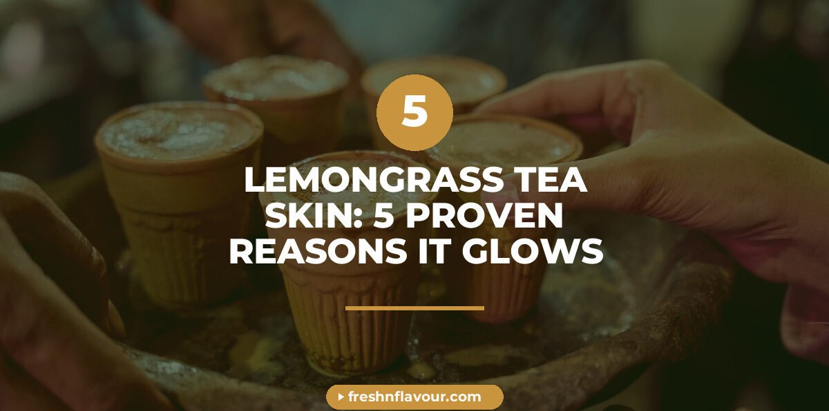 Cup of lemongrass tea for skin surrounded by fresh lemongrass and cardamom